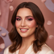 Close-up portrait of a happy woman in her late 20s, smiling confidently with vibrant, well-applied makeup, blurred rose and l